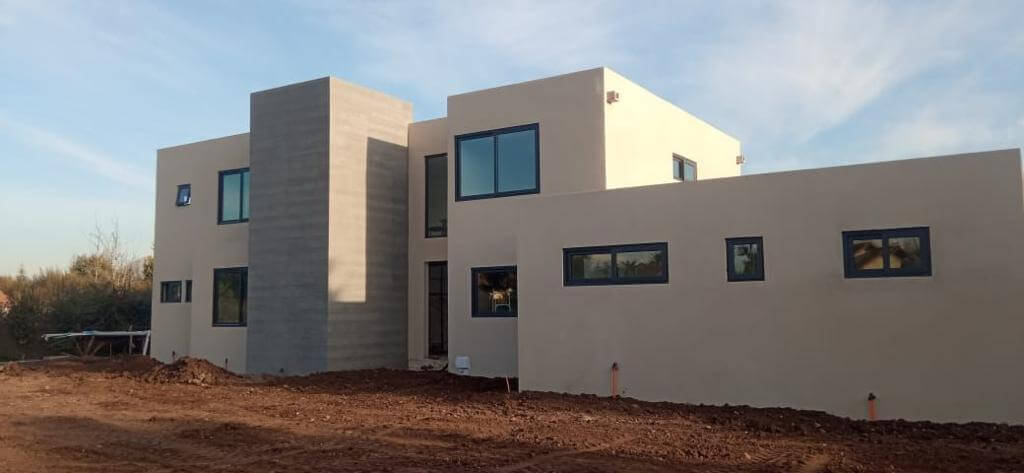 Casa 320m² construida con sistema ICF en Chicureo - EXACTA®